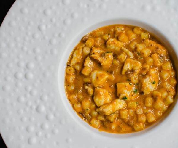 Pasta puttanesca met zeewolf